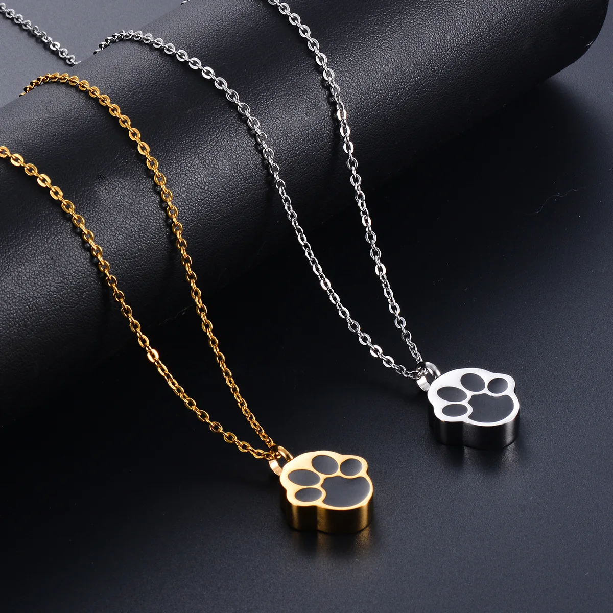 Gold and silver paw print pet memorial necklaces