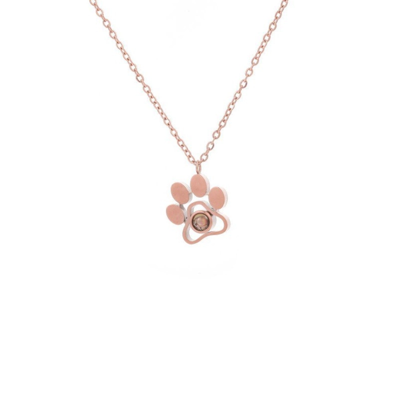 Rose gold paw photo projection necklace with chain on white background